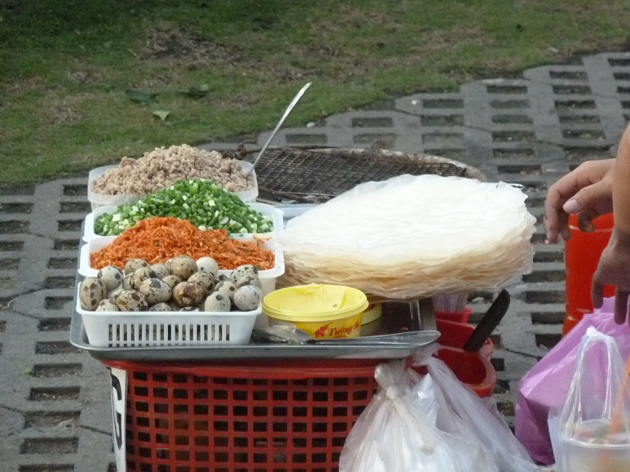 A specialist street food stall serving a single noodle dish in Vietnam