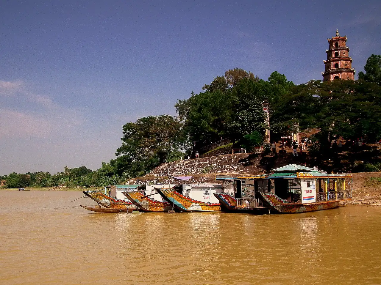 Boats on the river approach to the Perfume Pagoda near Hanoi, Vietnam