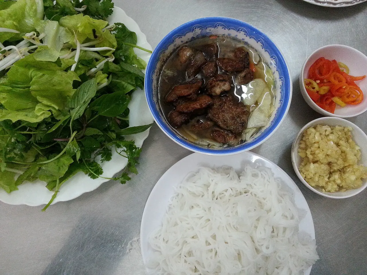 Bun cha, grilled pork with noodles and herbs, the signature dish of Hanoi