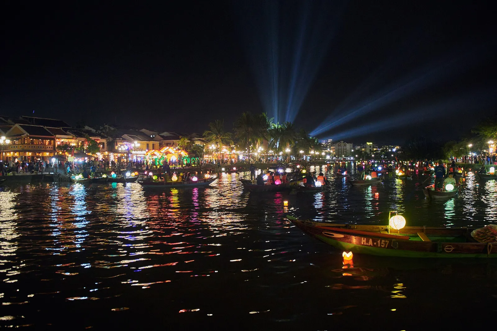 Lanterns reflected in the river beside the old town of Hoi An on Vietnam's central coast