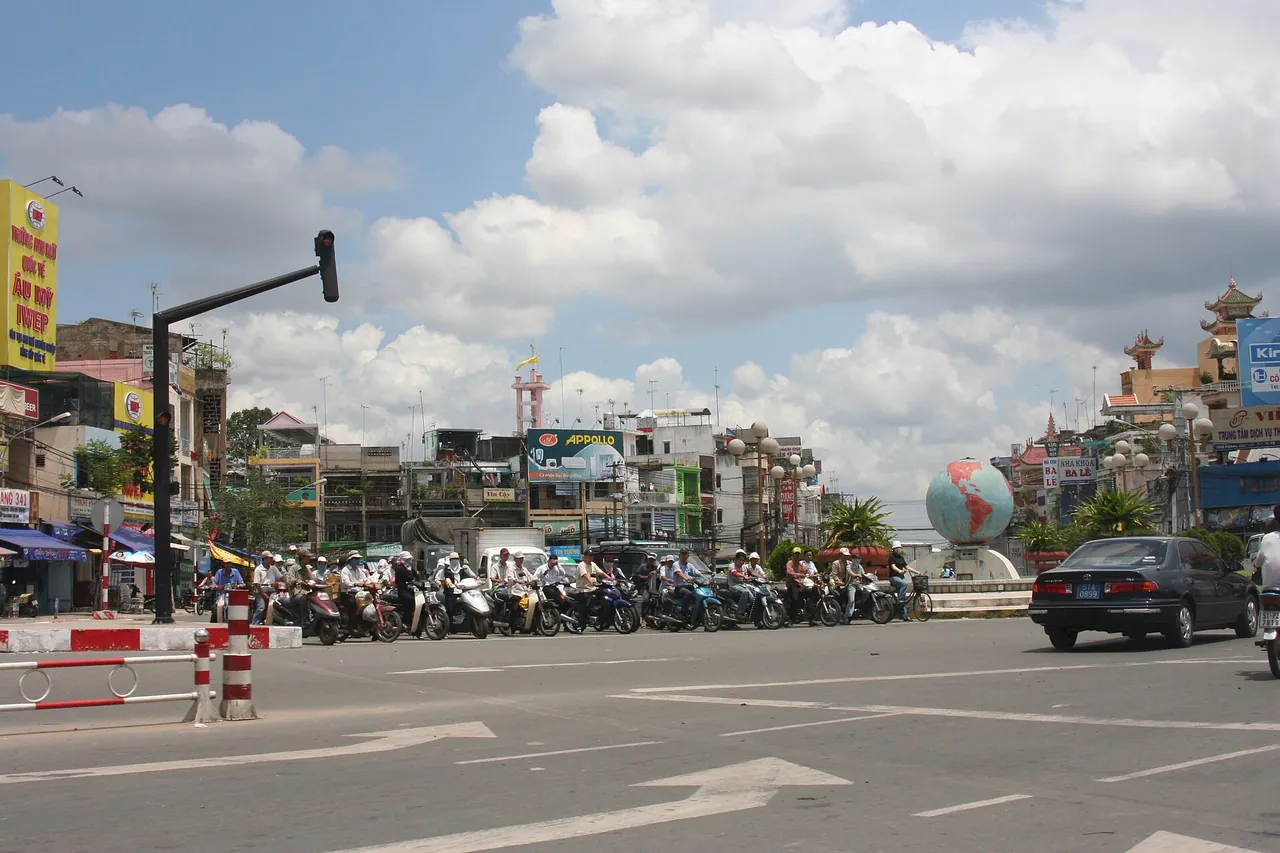 Busy street traffic in Ho Chi Minh City at the southern end of the classic Vietnam route