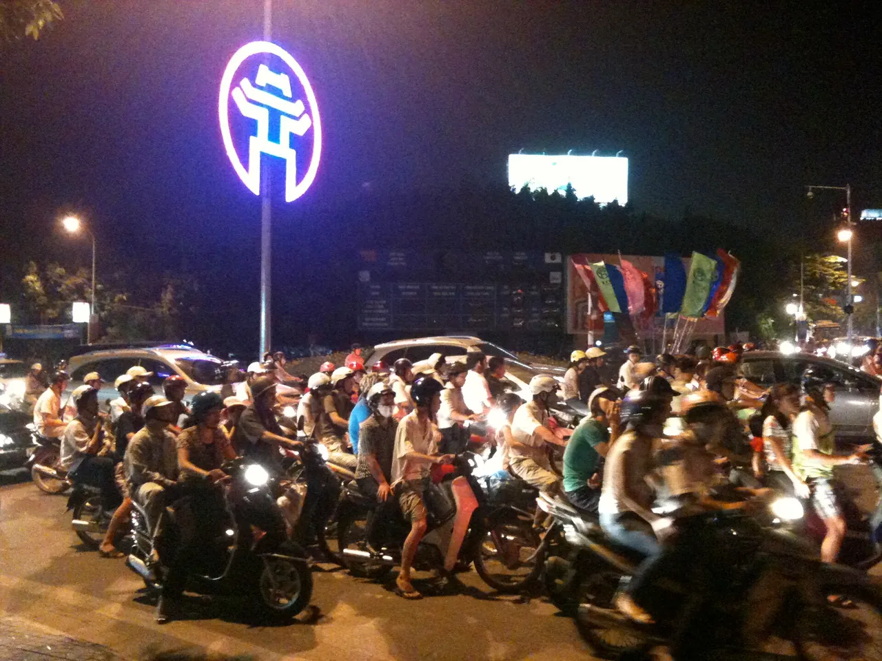 Dense motorbike traffic filling a street in Hanoi, the everyday transport of Vietnam