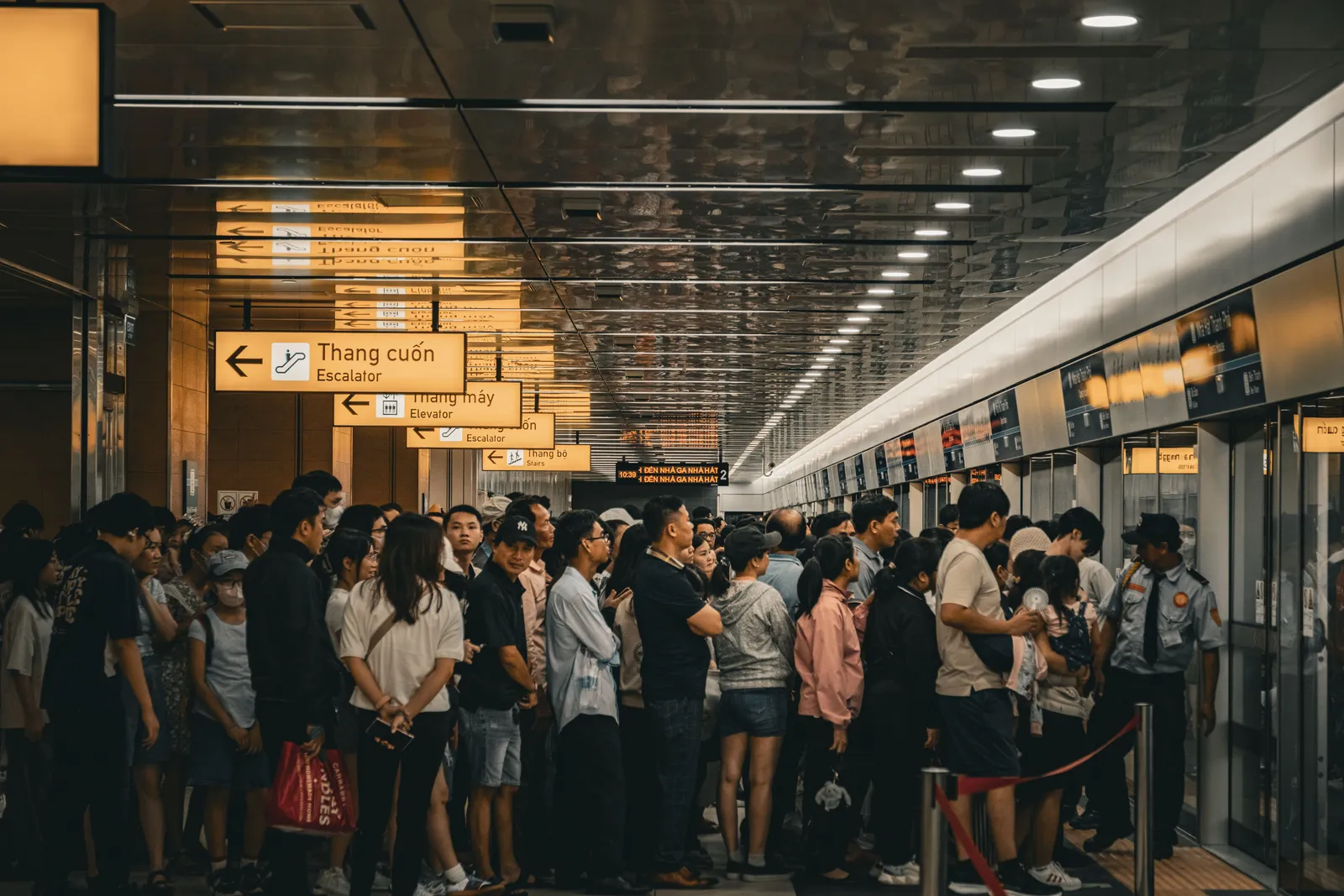 Passengers waiting on the platform of an underground metro station in Ho Chi Minh City, Vietnam