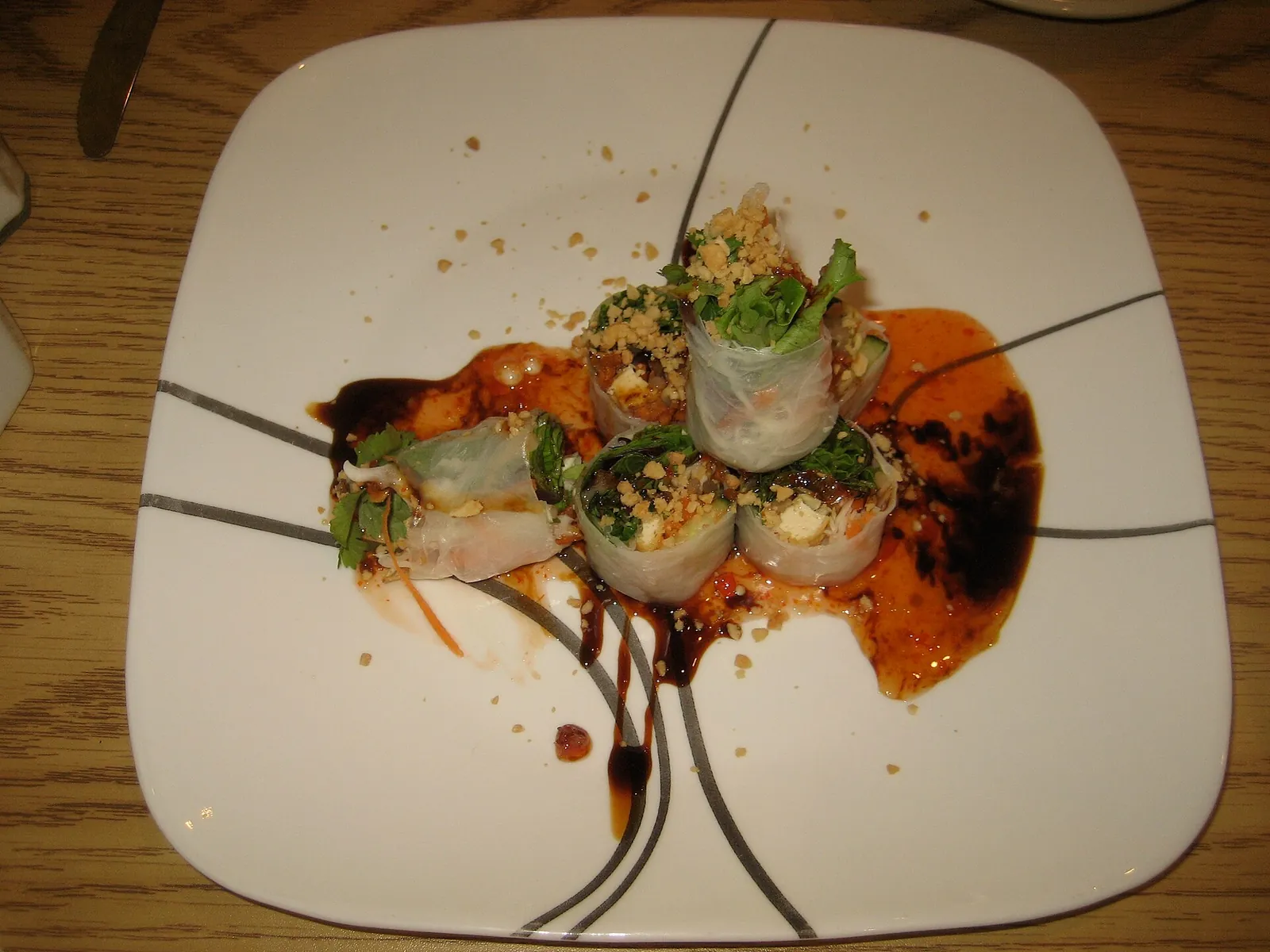 A spread of Vietnamese vegetarian dishes with tofu, vegetables and rice